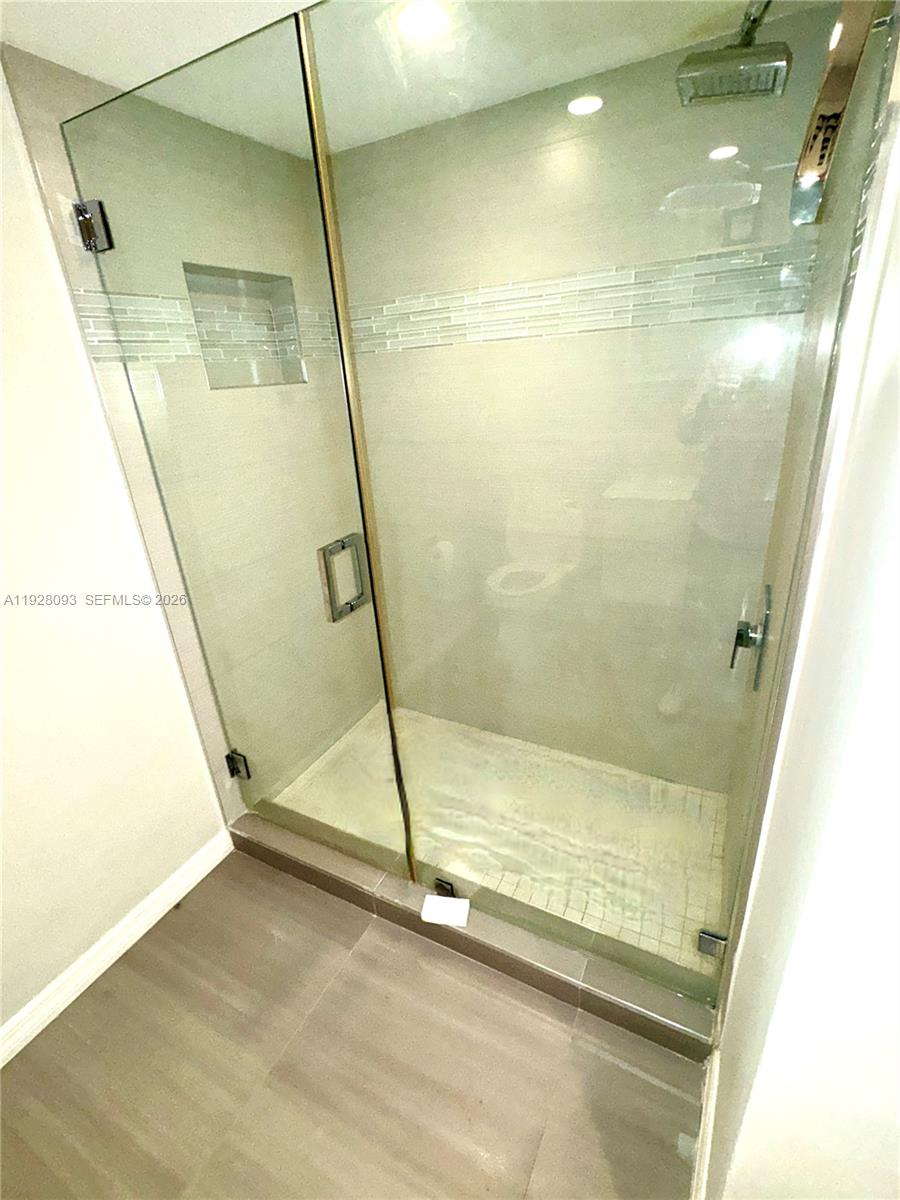 600 Northeast 36th Street, Unit 720 Miami, FL 33137 - Photo 12 of 26 a bathroom with a shower