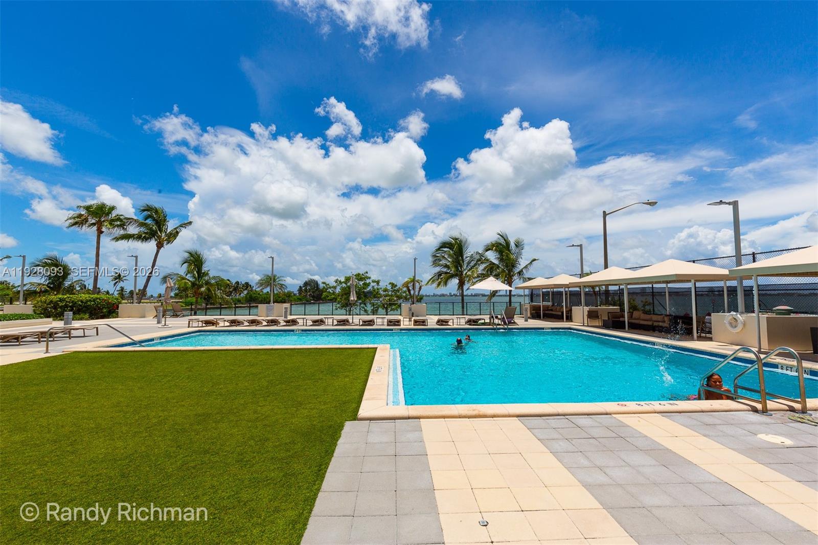 600 Northeast 36th Street, Unit 720 Miami, FL 33137 - Photo 16 of 26 a view of a swimming pool and a yard
