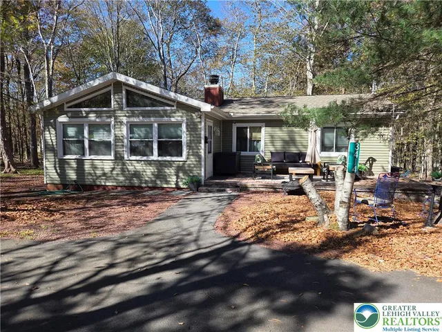 a view of a house with sitting area