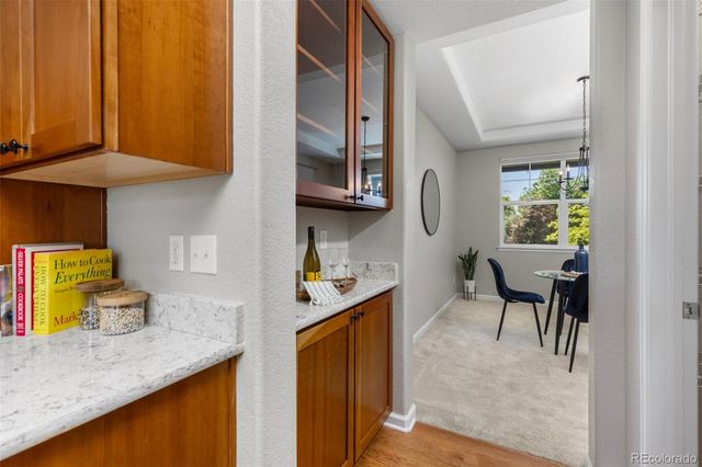 a kitchen with stainless steel appliances granite countertop counter top space a sink dishwasher and cabinets