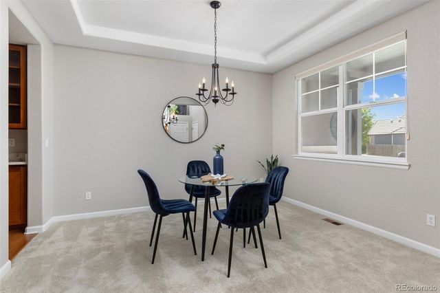 a table and chairs in a room