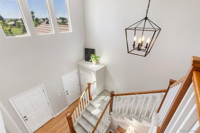 a view of staircase with white walls