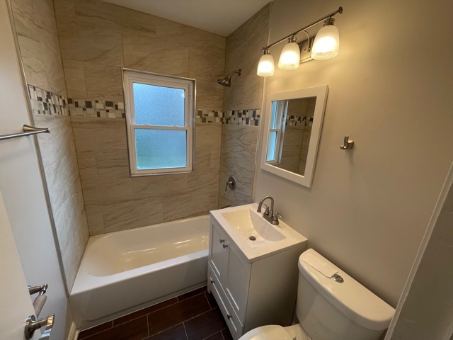 3865 216th Street Matteson, IL 60443 - Photo 7 of 13 a bathroom with a sink and a bathtub