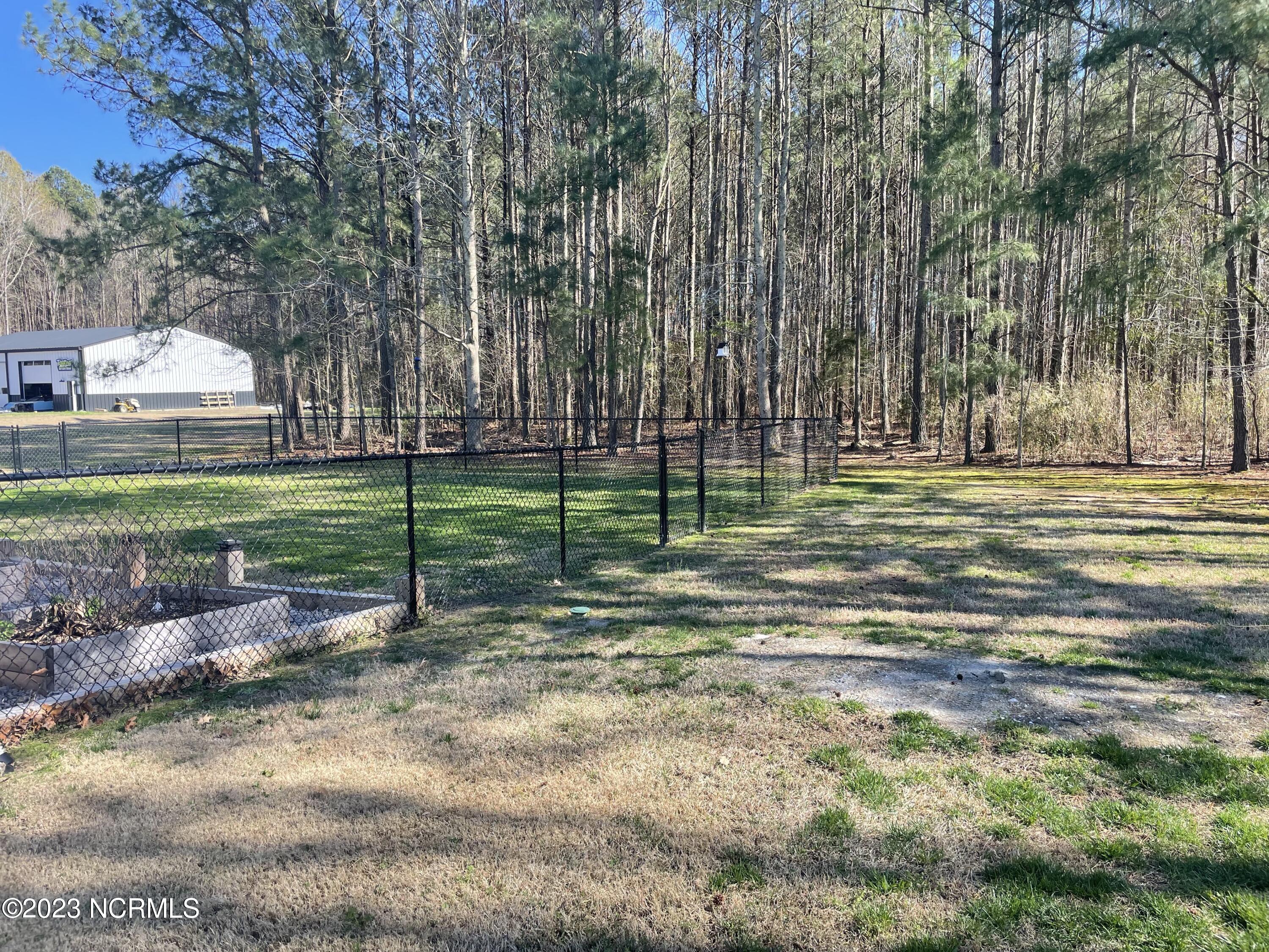 135 Trafton Road Camden, NC 27921 - Photo 9 of 47 Fenced in Backyard