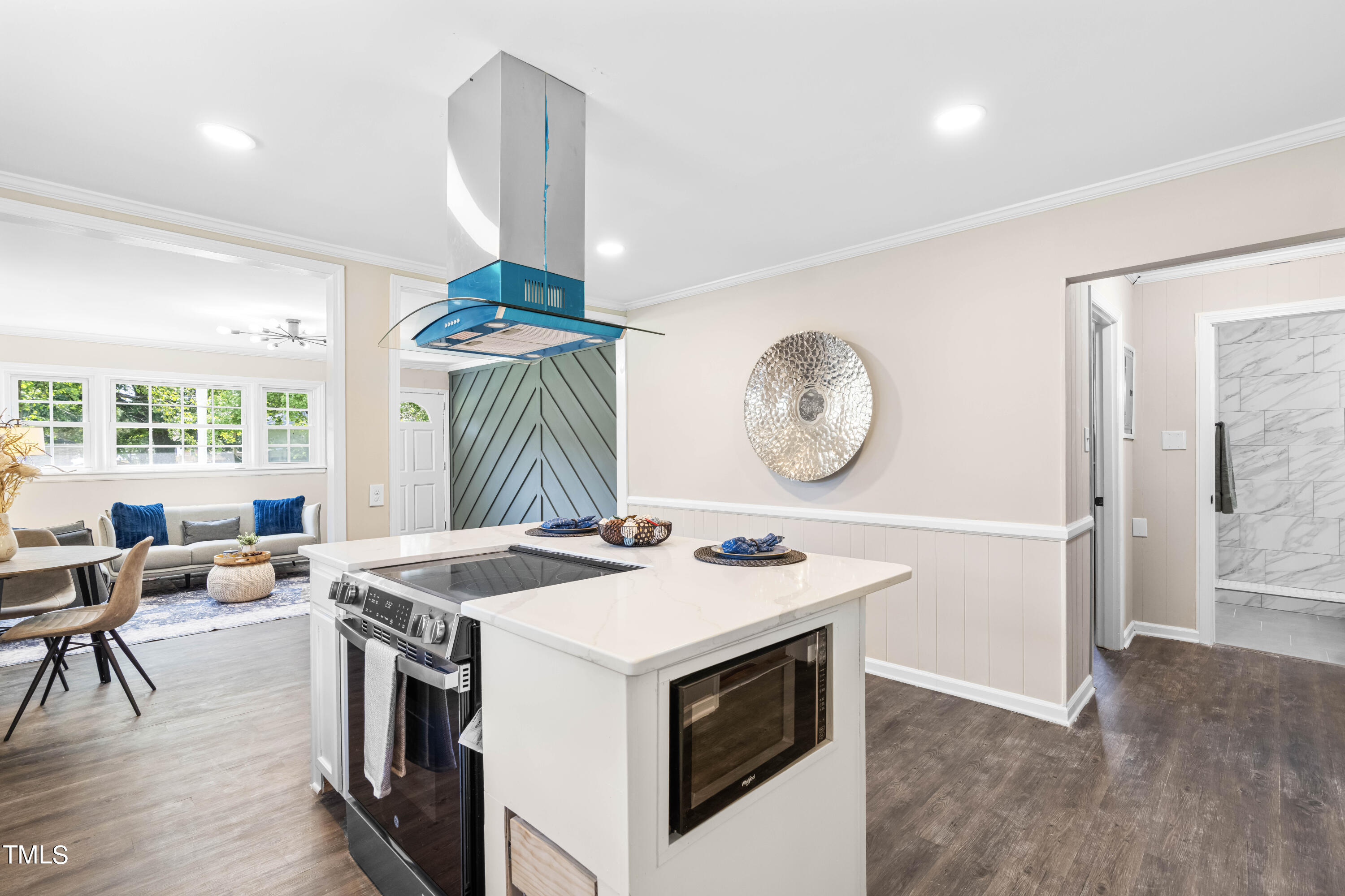 2616 Bullock Road Durham, NC 27704 - Photo 12 of 41 a kitchen with a stove a table and chairs