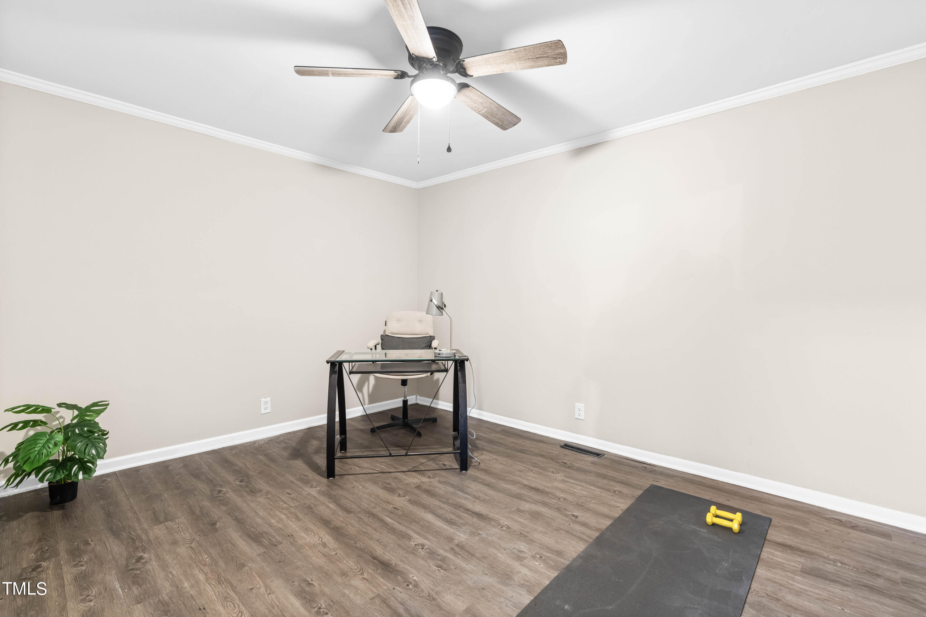 2616 Bullock Road Durham, NC 27704 - Photo 20 of 41 a view of a workspace with furniture and wooden floor