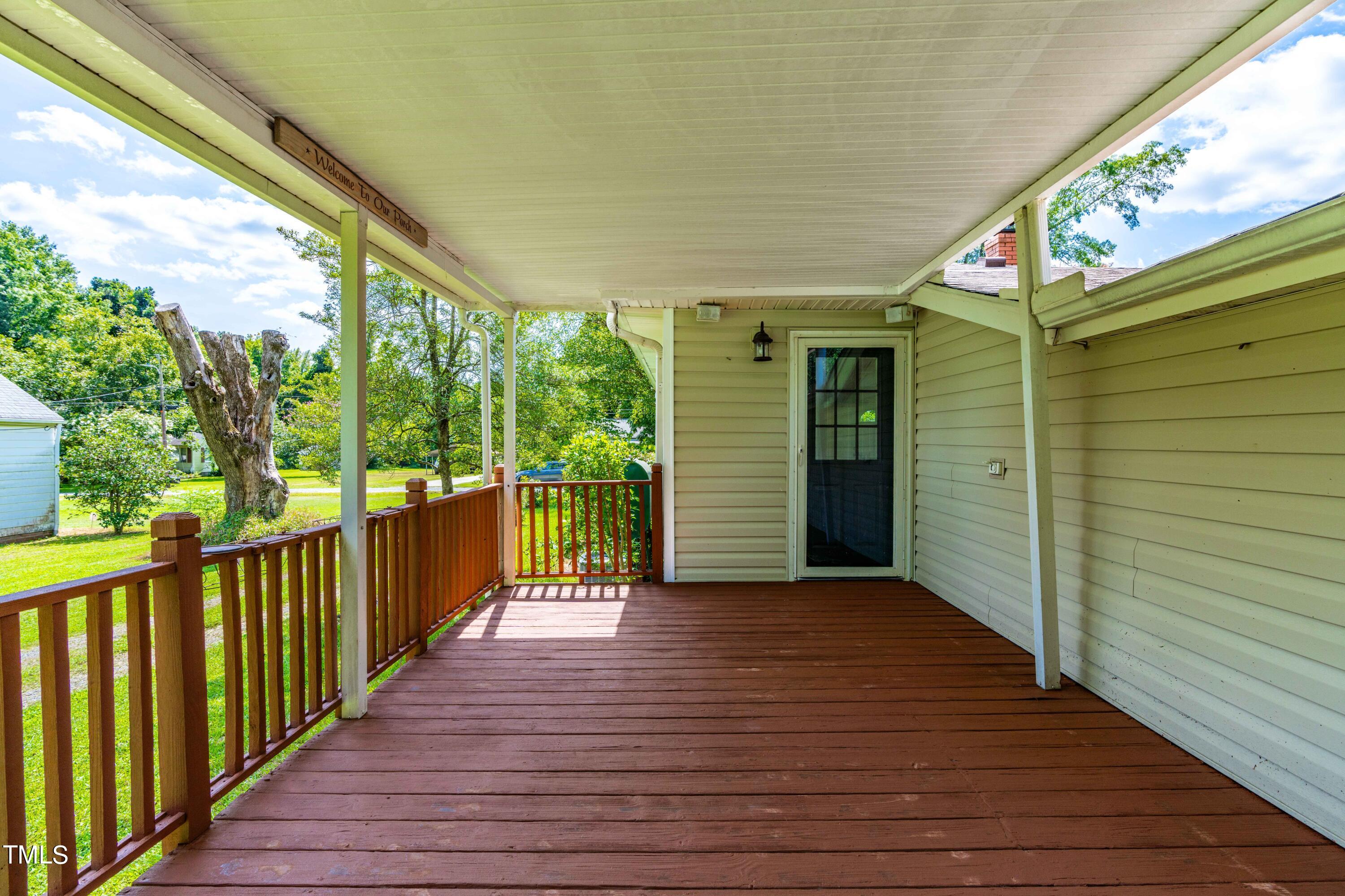 2616 Bullock Road Durham, NC 27704 - Photo 30 of 41 a view of a porch with wooden floor