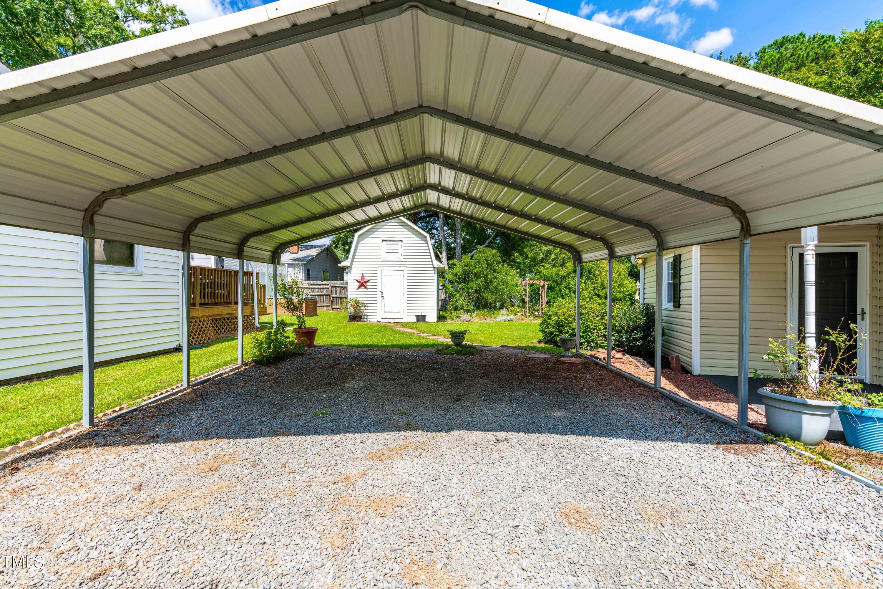 2616 Bullock Road Durham, NC 27704 - Photo 31 of 41 a front view of a house with garden