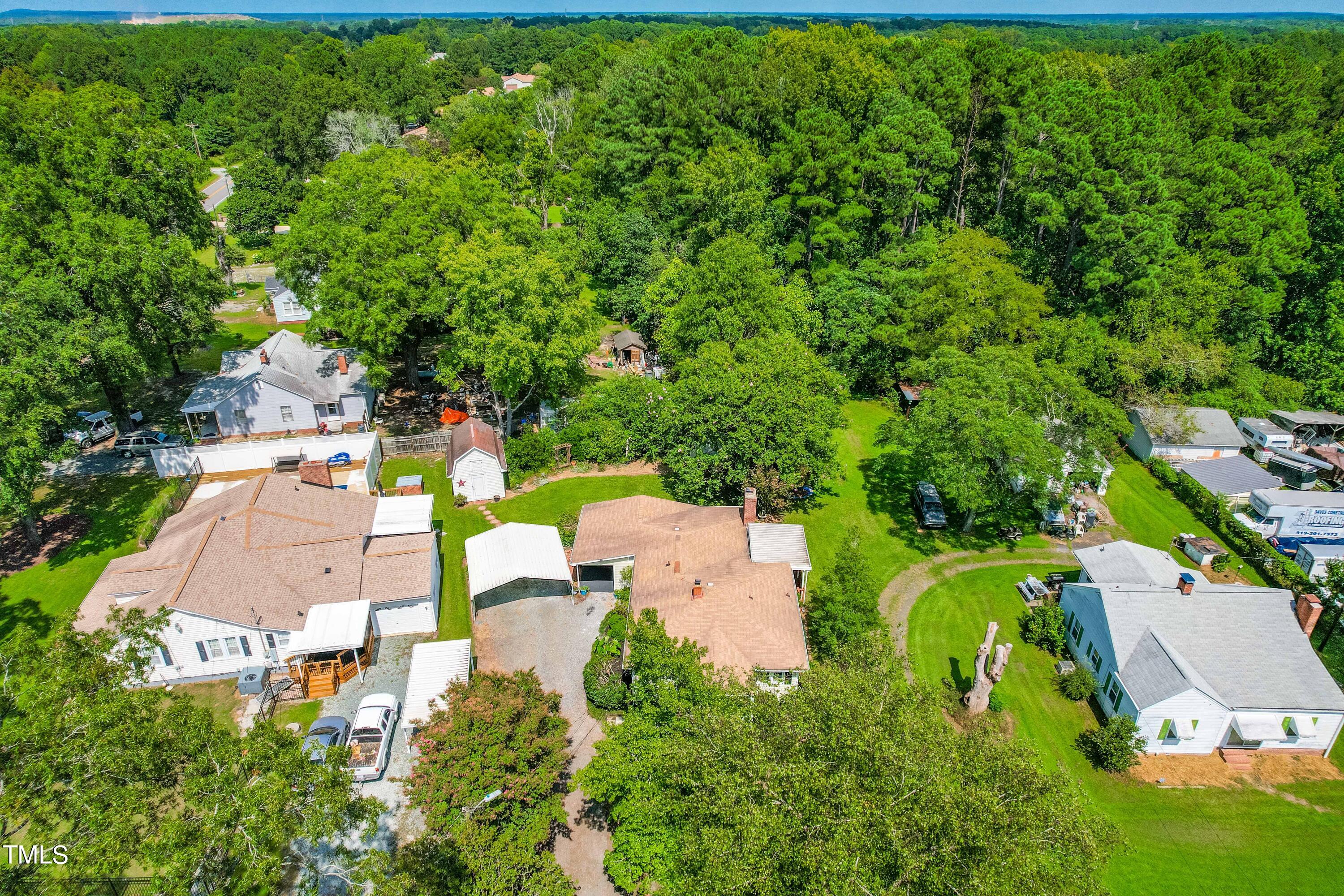 2616 Bullock Road Durham, NC 27704 - Photo 37 of 41 an aerial view of residential house with outdoor space and trees all around