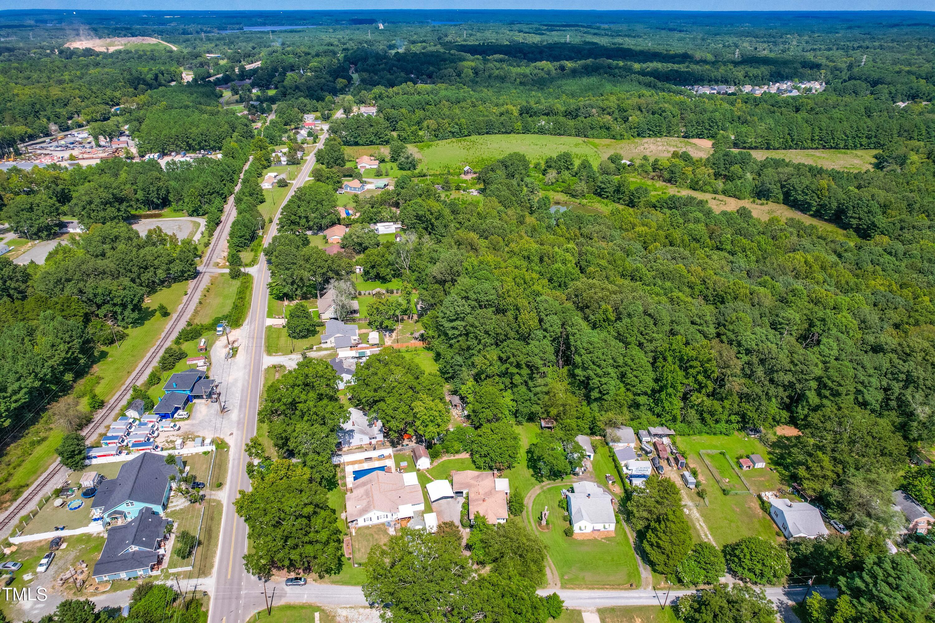 2616 Bullock Road Durham, NC 27704 - Photo 39 of 41 an aerial view of residential houses with outdoor space and trees