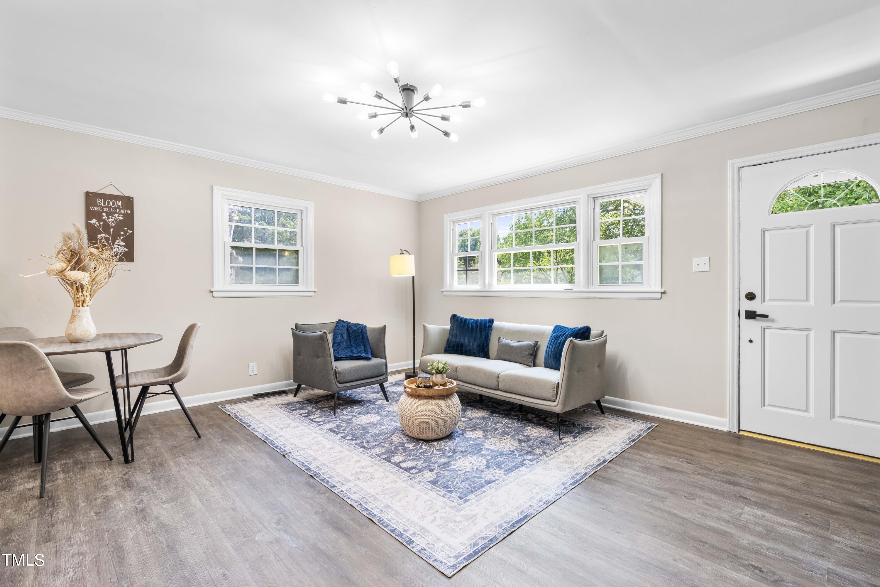 2616 Bullock Road Durham, NC 27704 - Photo 8 of 41 a living room with furniture and wooden floor
