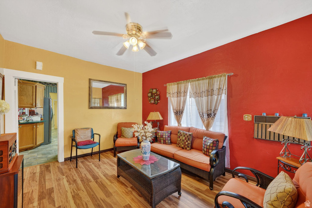 977 23rd Street Ogden, UT 84401 - Photo 3 of 29 Living area with a ceiling fan and light wood-type flooring