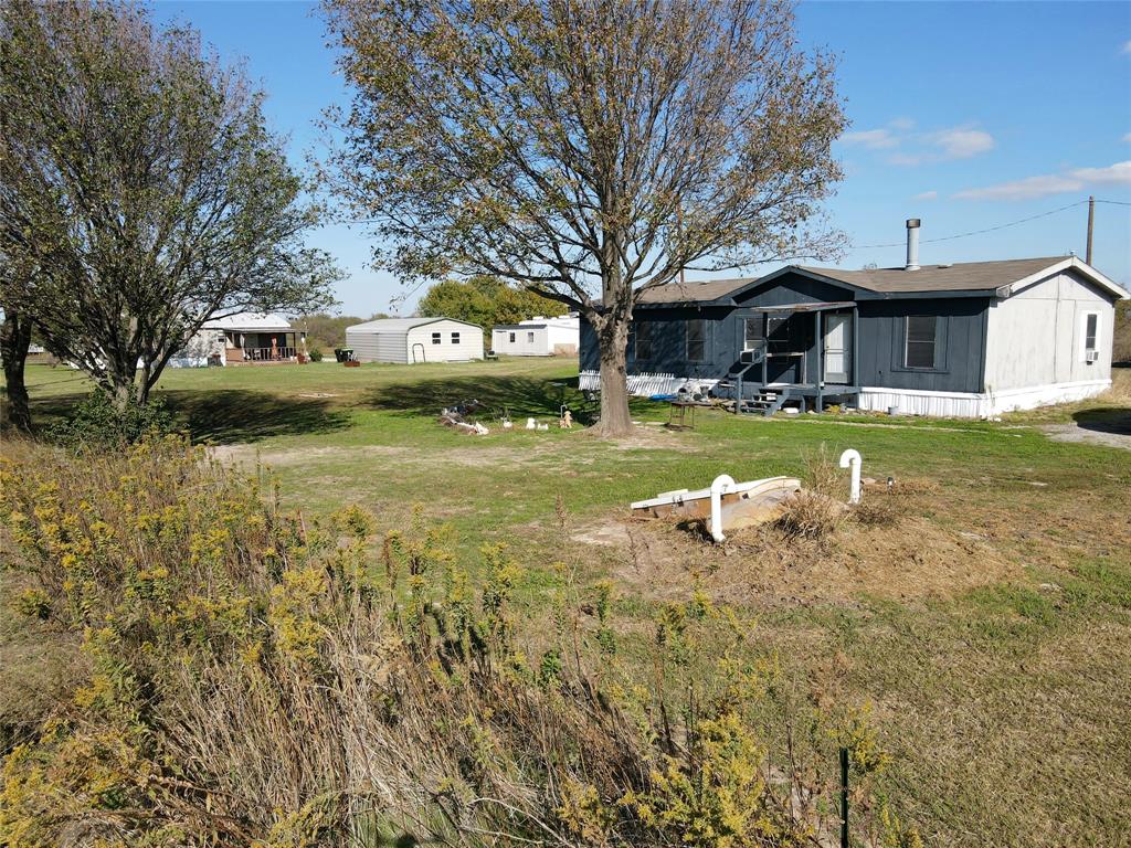 16531 Farm To Market 455 Pilot Point, TX 76258 - Photo 24 of 37 View of grassy yard