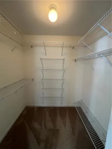 a view of a room with racks on the wall