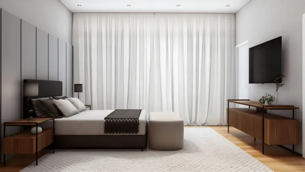 a living room with furniture a flat screen tv and a window