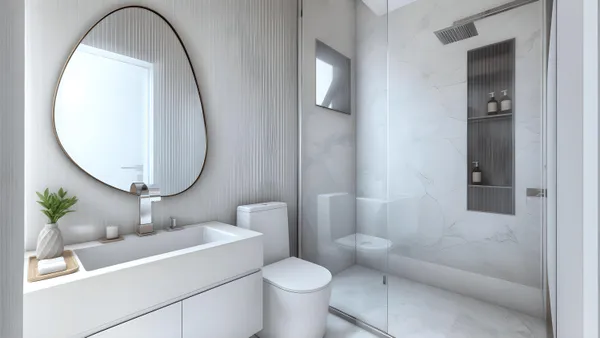 a bathroom with a toilet a sink and a mirror