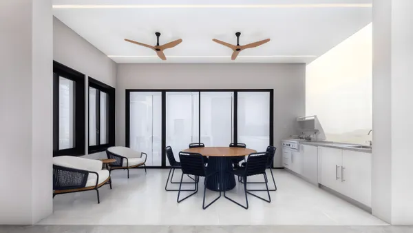 a workspace with furniture and window