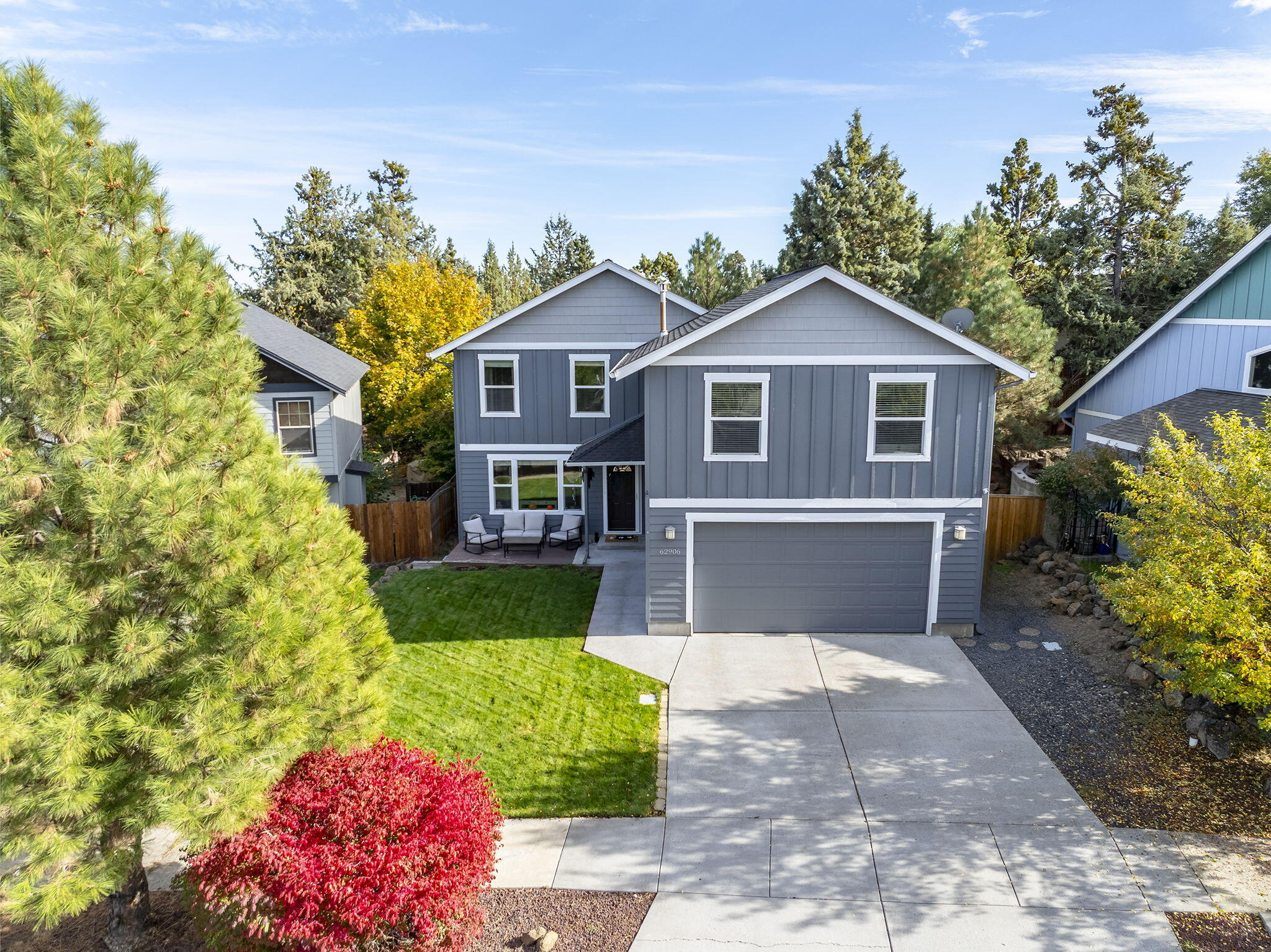 62906 Bilyeu Way Bend, OR 97701 - Photo 39 of 100 a front view of a house with a yard and garage