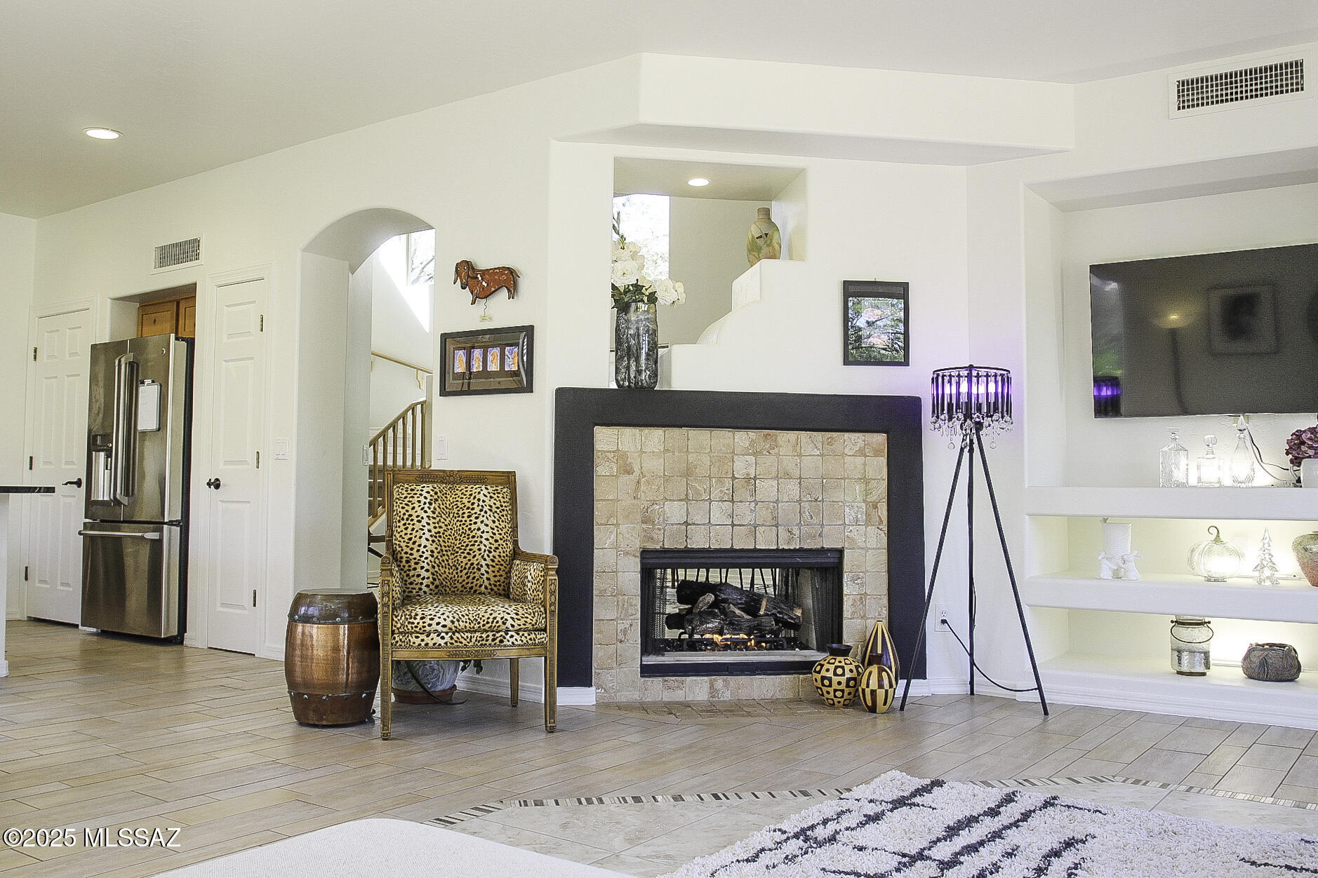 5202 Spring View Drive Tucson, AZ 85749 - Photo 14 of 49 a living room with furniture and a fireplace