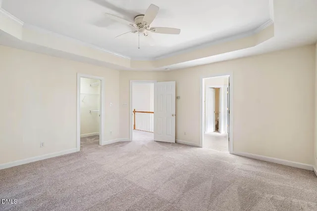 a spacious bathroom with a granite countertop sink mirror and a