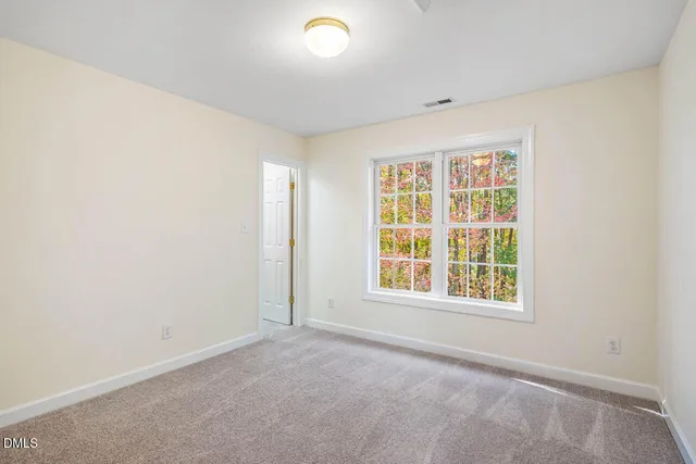 a view of storage and utility room with washer and dryer
