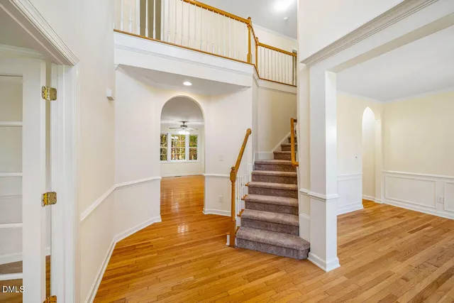 a view of entryway with wooden floor