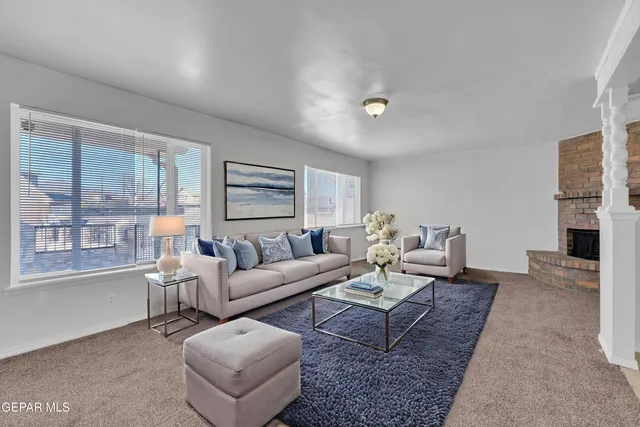 a view of empty room with ceiling fan
