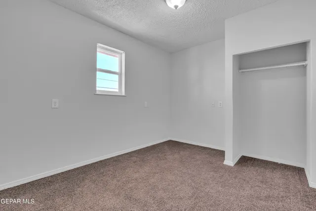 a front view of a house with windows