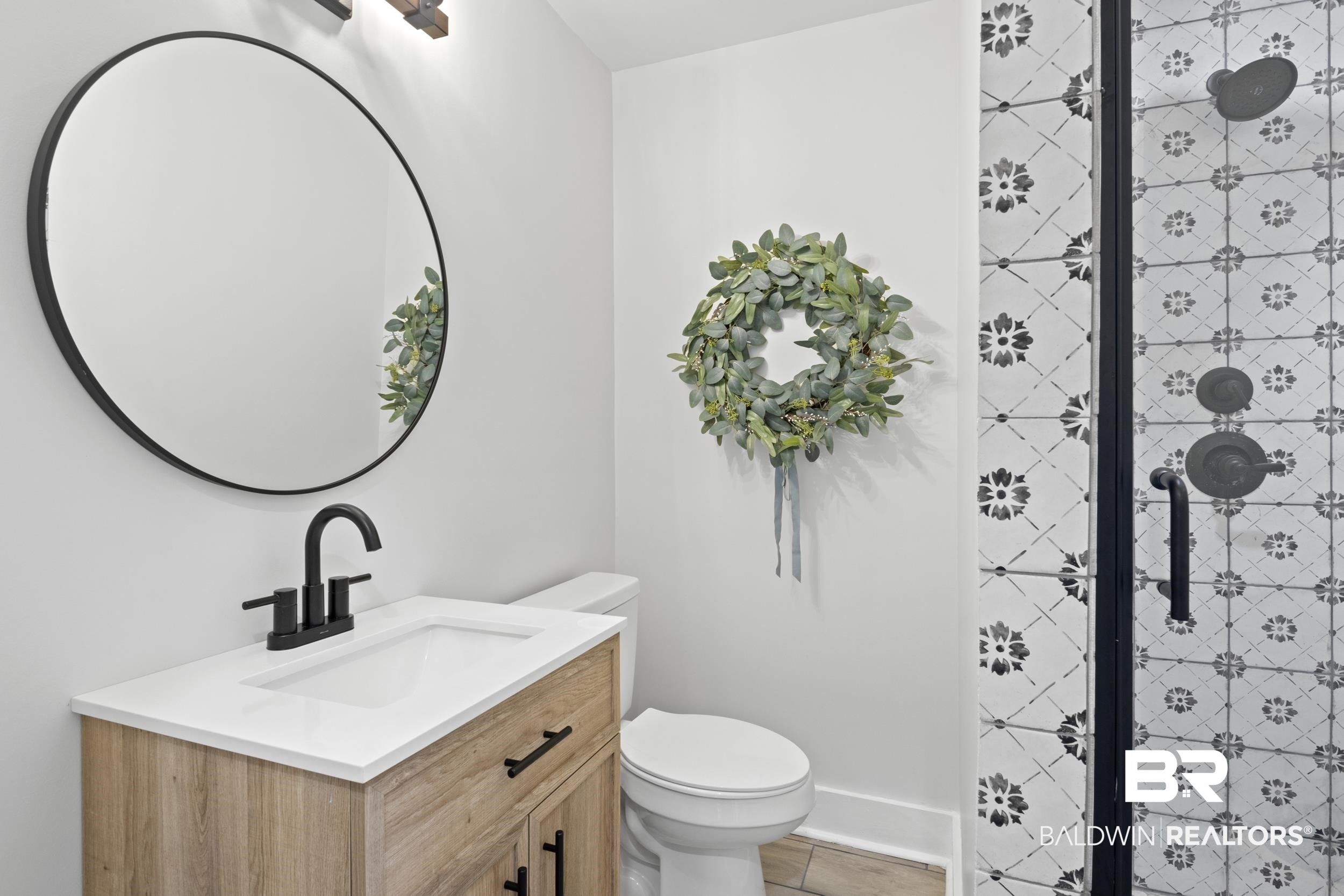 315 Park Avenue Mobile, AL 36607 - Photo 22 of 27 Bathroom featuring vanity, toilet, and tile patterned flooring