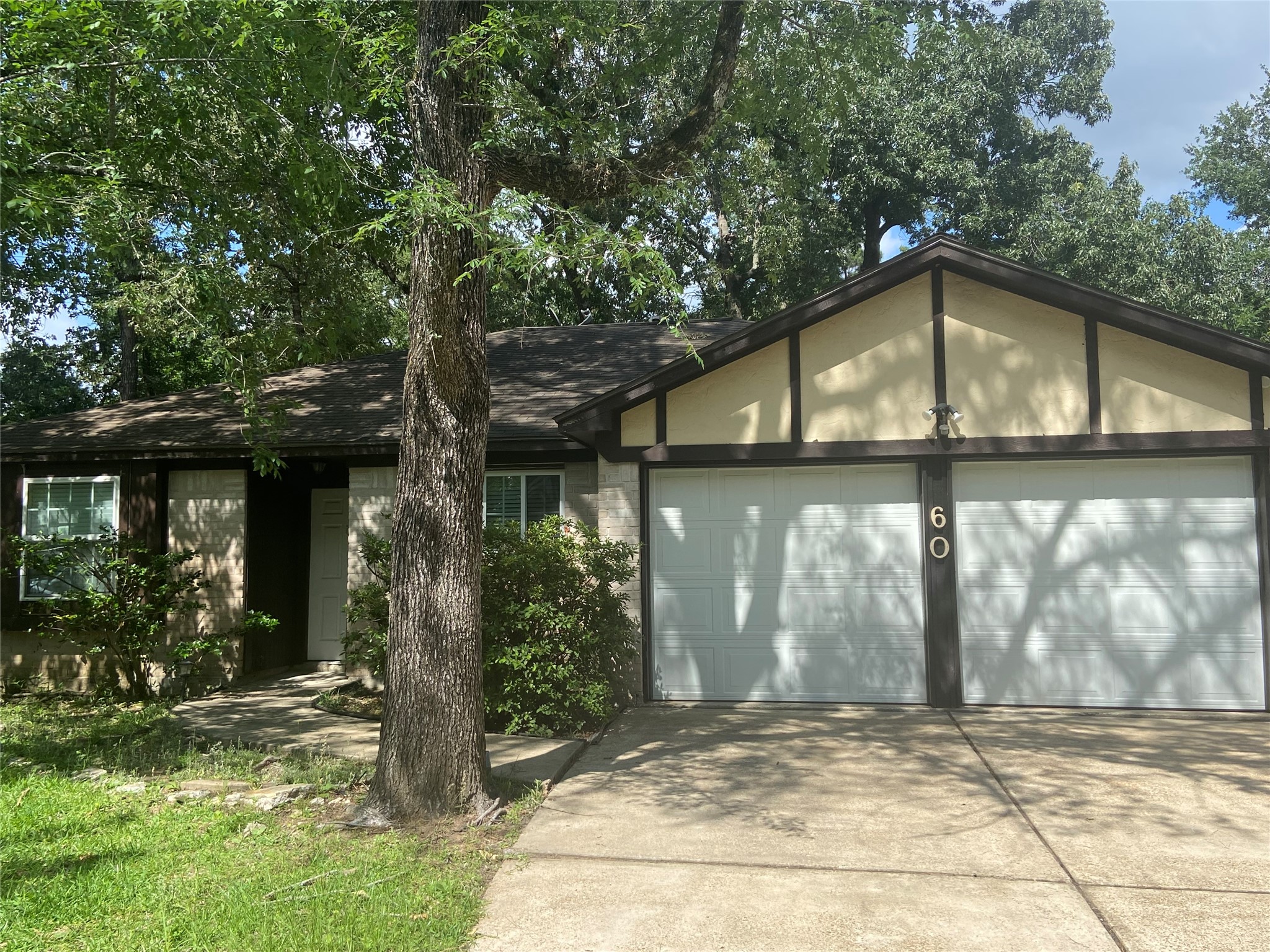 60 Oldstream Court Spring, TX 77381 - Photo 1 of 9 a front view of house