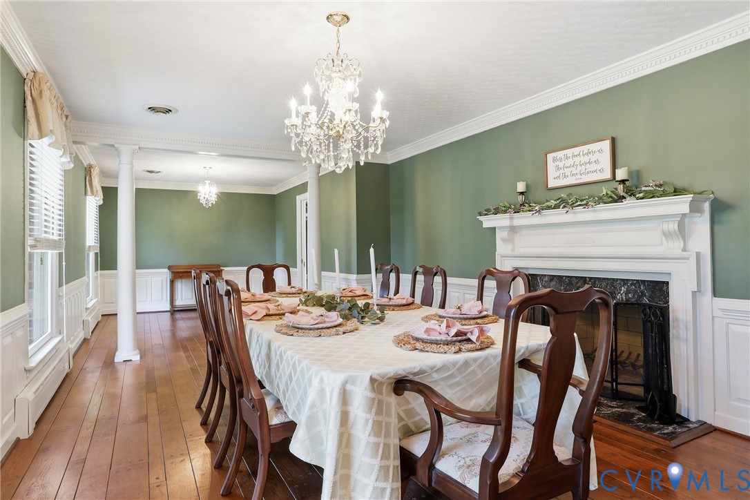 13300 West Patrick Henry Road Doswell, VA 23047 - Photo 6 of 69 Dining area featuring a crystal chandelier, a deco