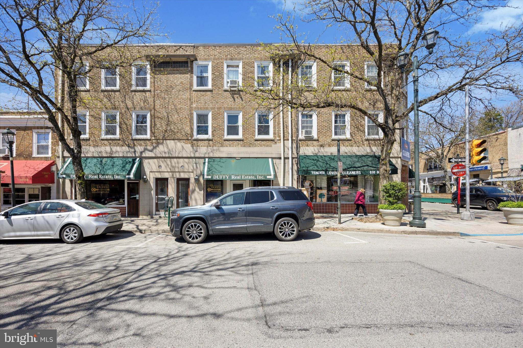 241 Haverford Avenue, Unit 3 Narberth, PA 19072 - Photo 1 of 13 a car parked in front of a building