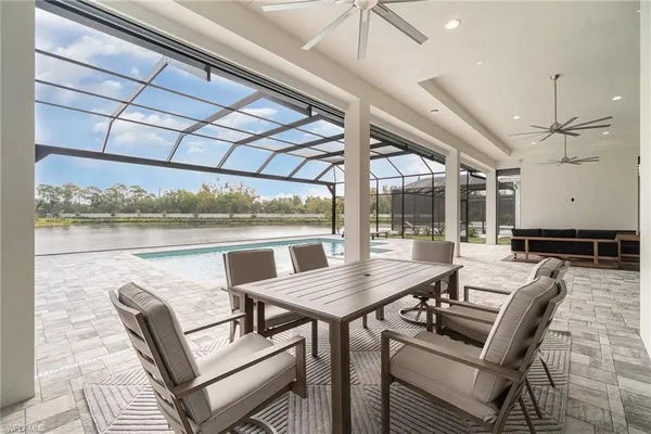 a view of a dining room with furniture window and outside view