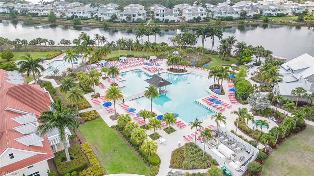 8900 Nevis Way Naples, FL 34112 - Photo 34 of 34 an aerial view of lake residential house with outdoor space and seating around