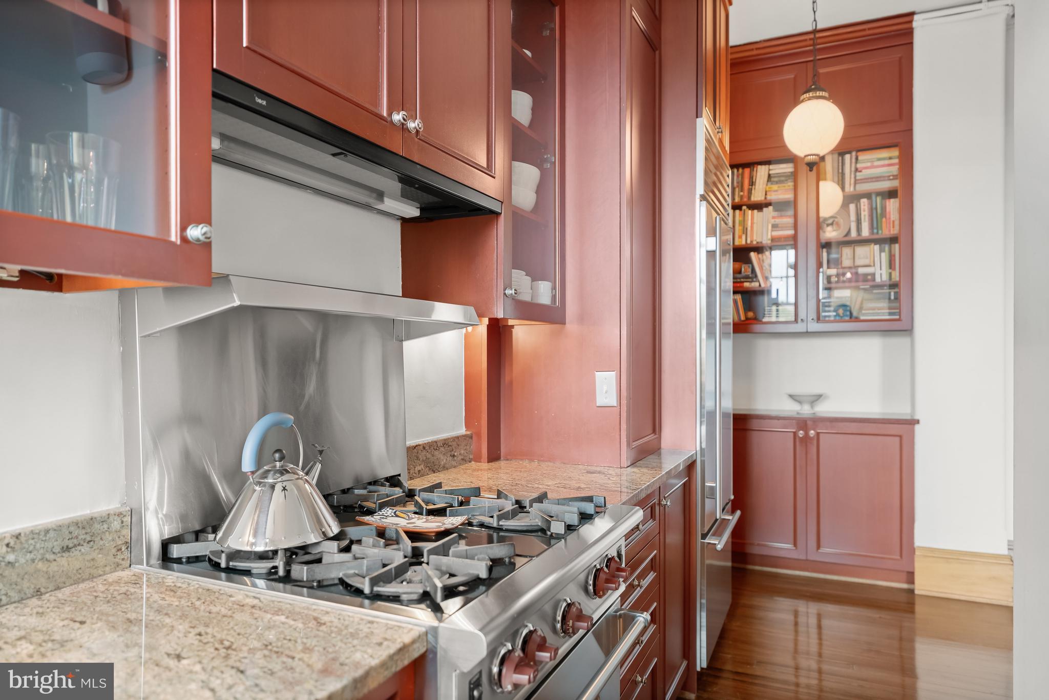 2853 Ontario Road Northwest, Unit 421 Washington, DC 20009 - Photo 13 of 33 Kitchen w/ Sub-Zero refrigerator & granite counter