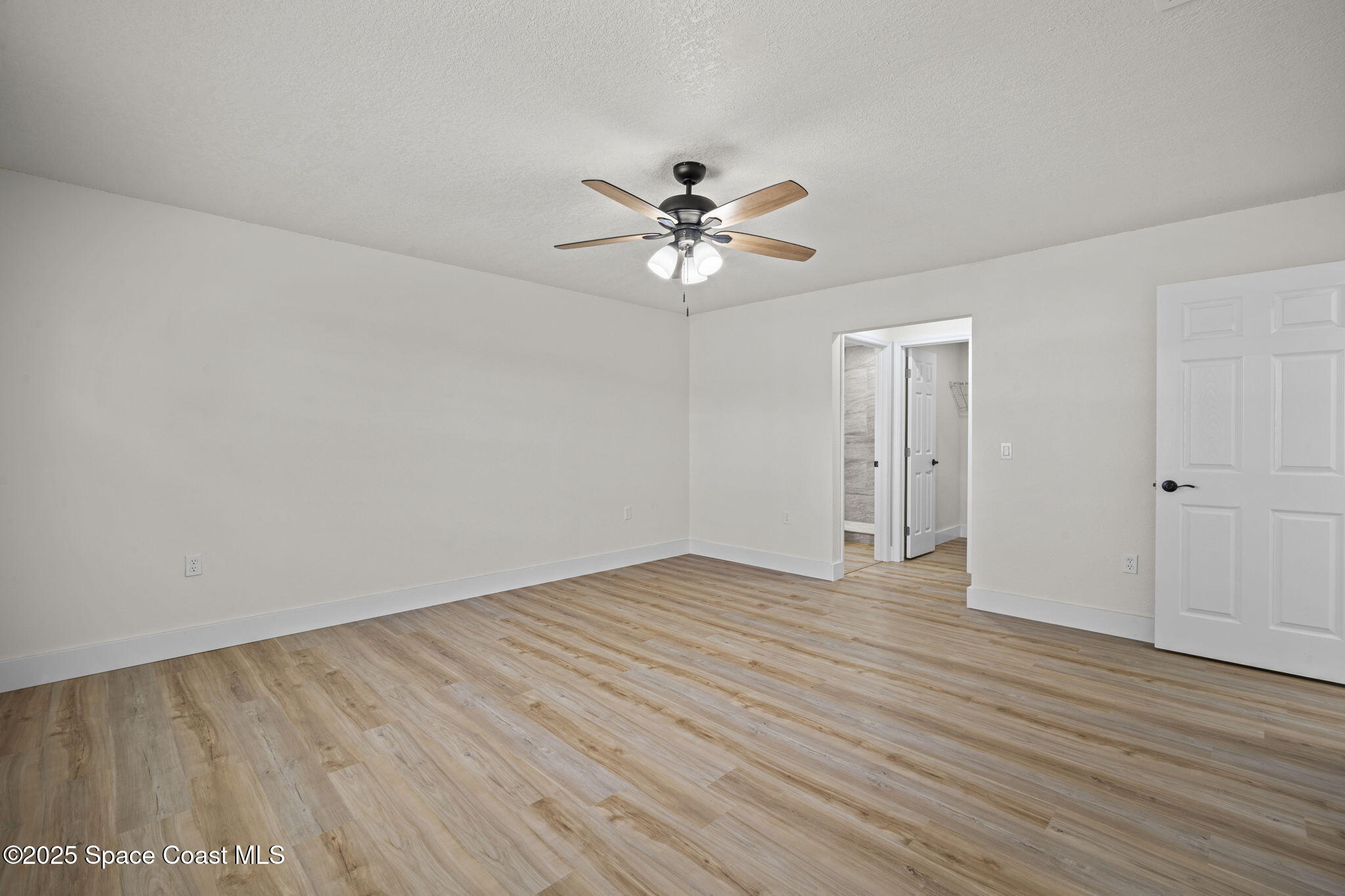 5130 Carter Street Cocoa, FL 32927 - Photo 17 of 33 a view of an empty room with a window