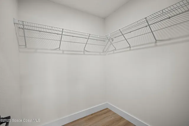 a view of a room with racks on the wall