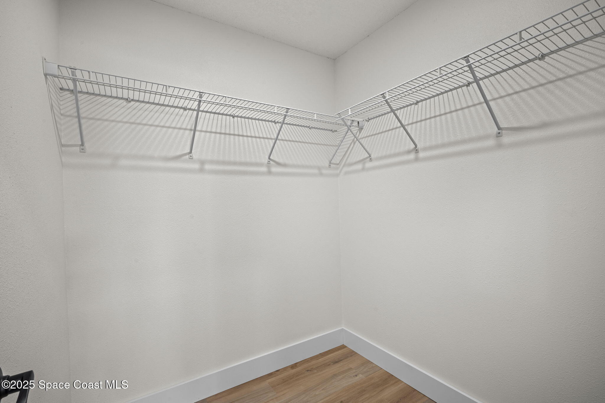 5130 Carter Street Cocoa, FL 32927 - Photo 19 of 33 a view of a room with racks on the wall