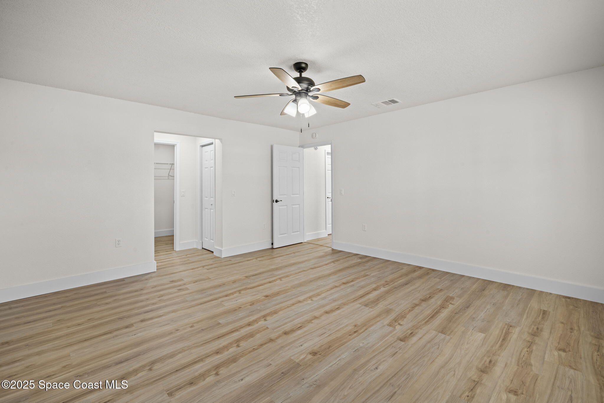 5130 Carter Street Cocoa, FL 32927 - Photo 22 of 33 a view of an empty room with a window