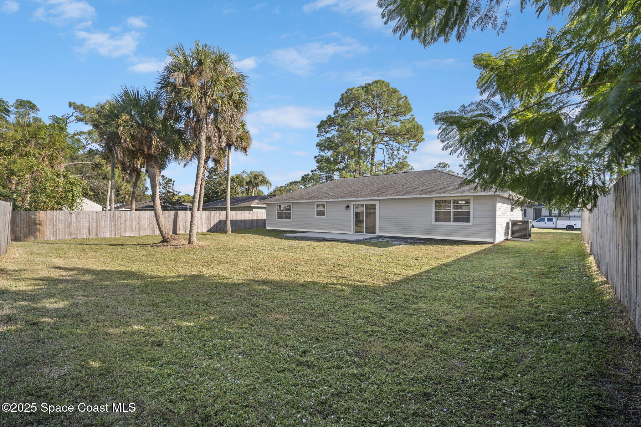 5130 Carter Street Cocoa, FL 32927 - Photo 30 of 33 a view of a house with a yard