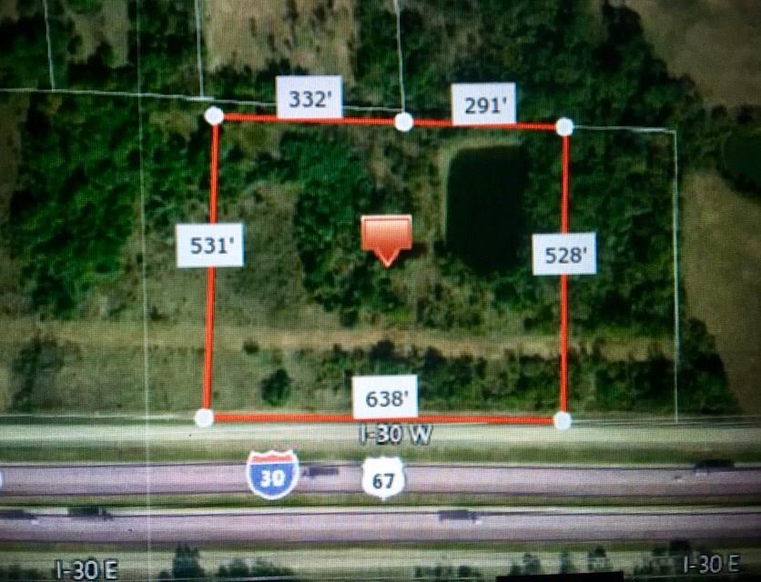 30 West Interstate 30 Sulphur Springs, TX 75482 - Photo 9 of 14 a front view of a house with garden