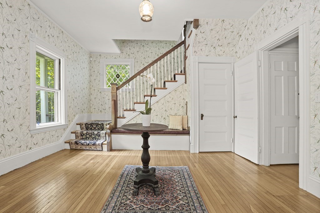 37 Glen Road Wellesley, MA 02481 - Photo 2 of 39 a view of entryway with wooden floor and stairs