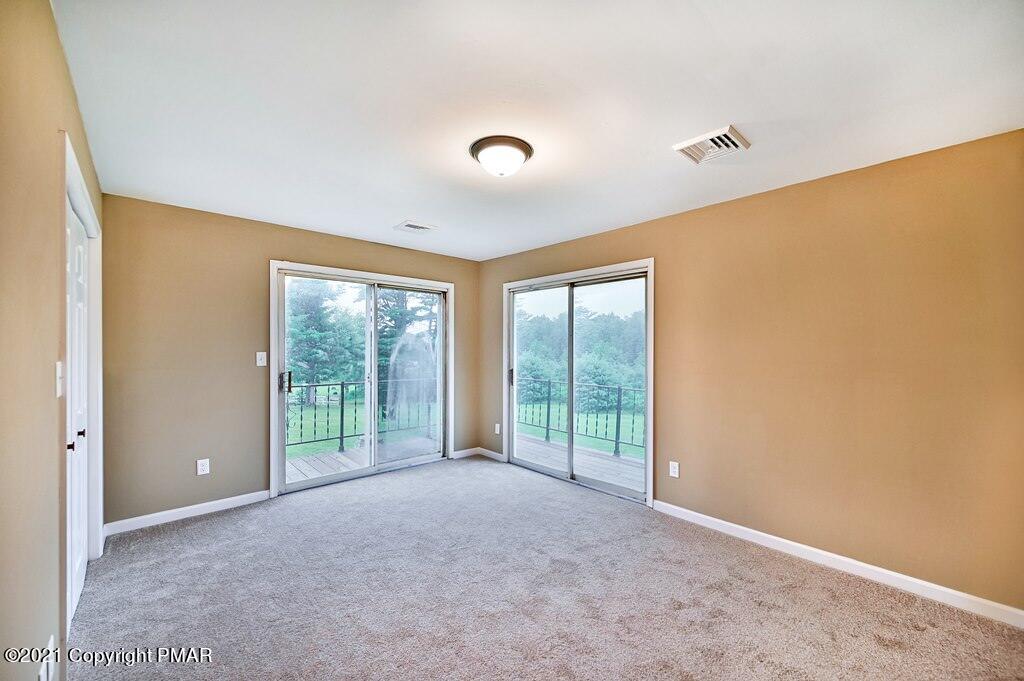 171 VanWhy Road Bushkill, PA 18324 - Photo 24 of 61 a view of an empty room with a balcony