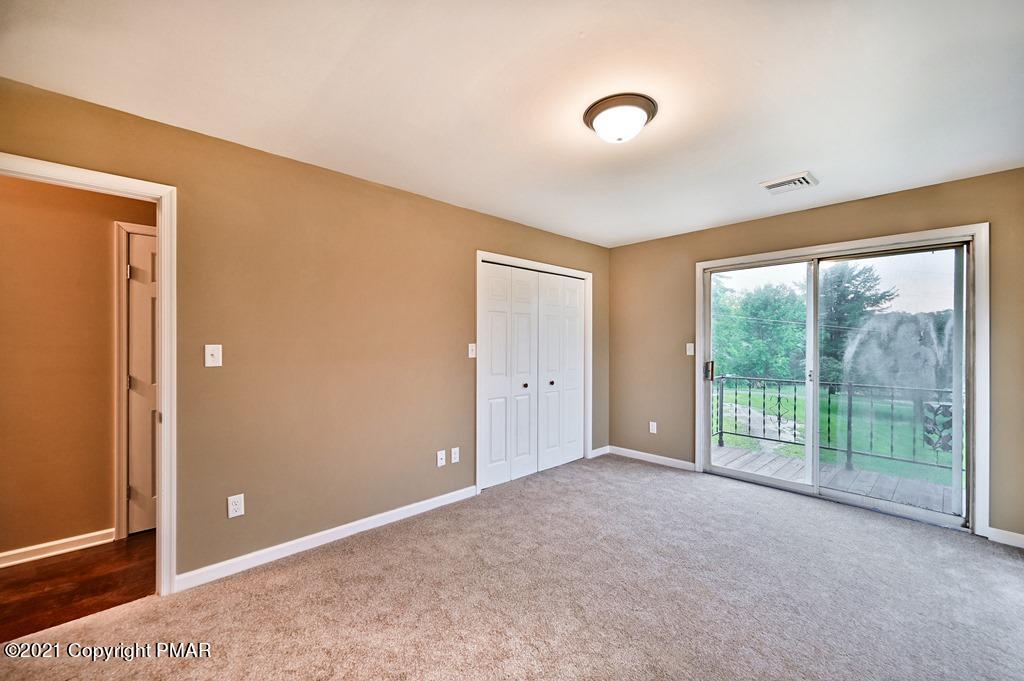 171 VanWhy Road Bushkill, PA 18324 - Photo 25 of 61 a view of an empty room with glass door