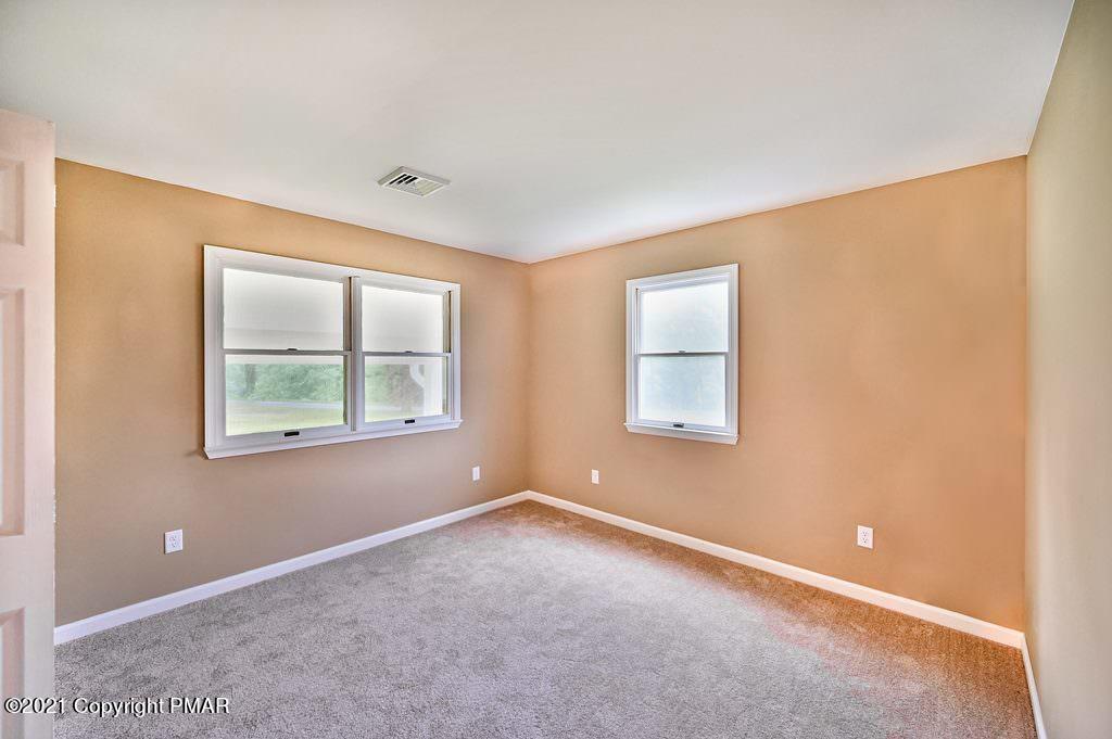 171 VanWhy Road Bushkill, PA 18324 - Photo 32 of 61 a view of an empty room with windows
