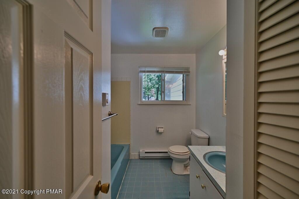171 VanWhy Road Bushkill, PA 18324 - Photo 38 of 61 a bathroom with a toilet