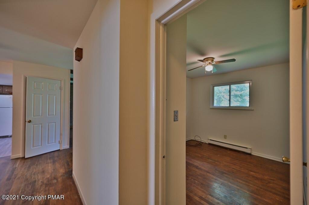 171 VanWhy Road Bushkill, PA 18324 - Photo 43 of 61 a view of a hallway with wooden floor