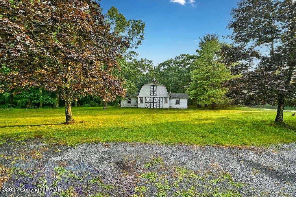 171 VanWhy Road Bushkill, PA 18324 - Photo 55 of 61 a view of swimming pool with a yard