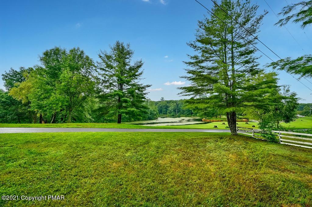 171 VanWhy Road Bushkill, PA 18324 - Photo 57 of 61 a view of a big yard with a large trees