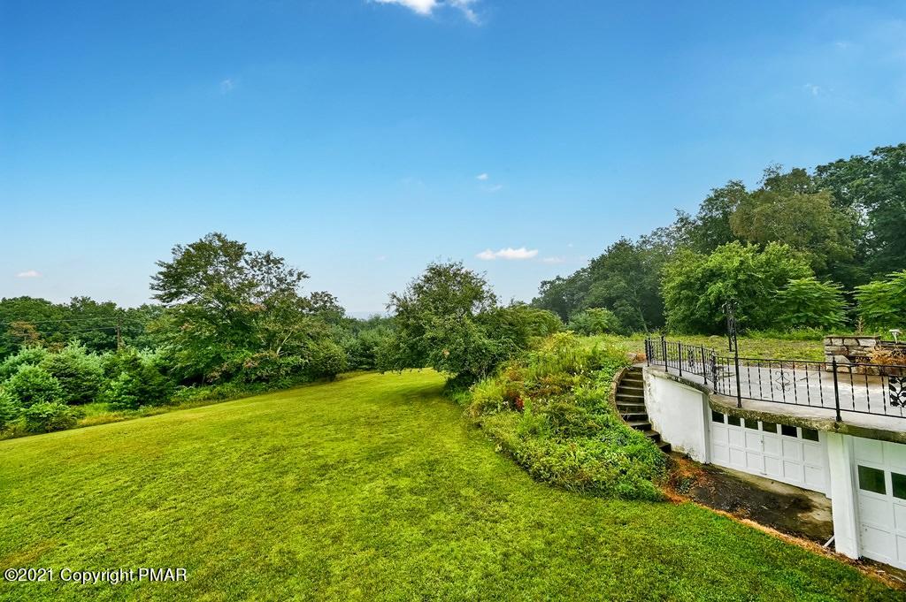 171 VanWhy Road Bushkill, PA 18324 - Photo 61 of 61 a view of a garden with deck